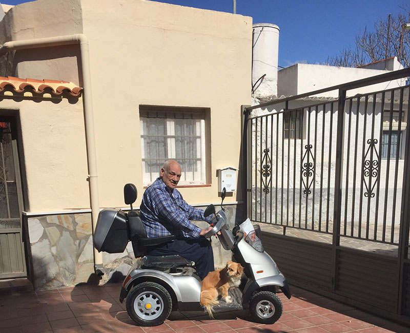 Breeze S4 Mobility Scooter and a happy customer in Spain