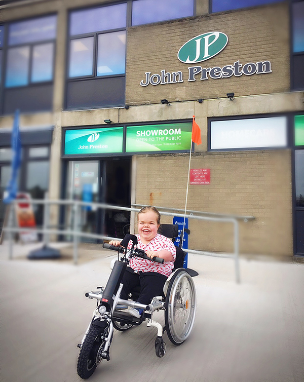 Firefly wheelchair attachment - happy customer Sarah